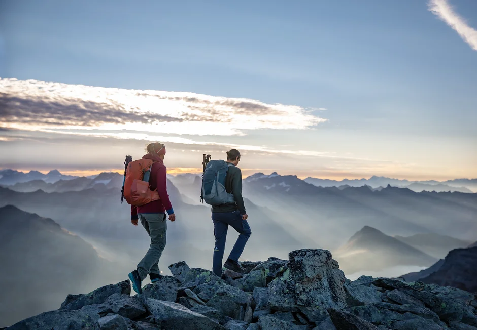 hikers, mountain, backpacks, rocky terrain, sunrise