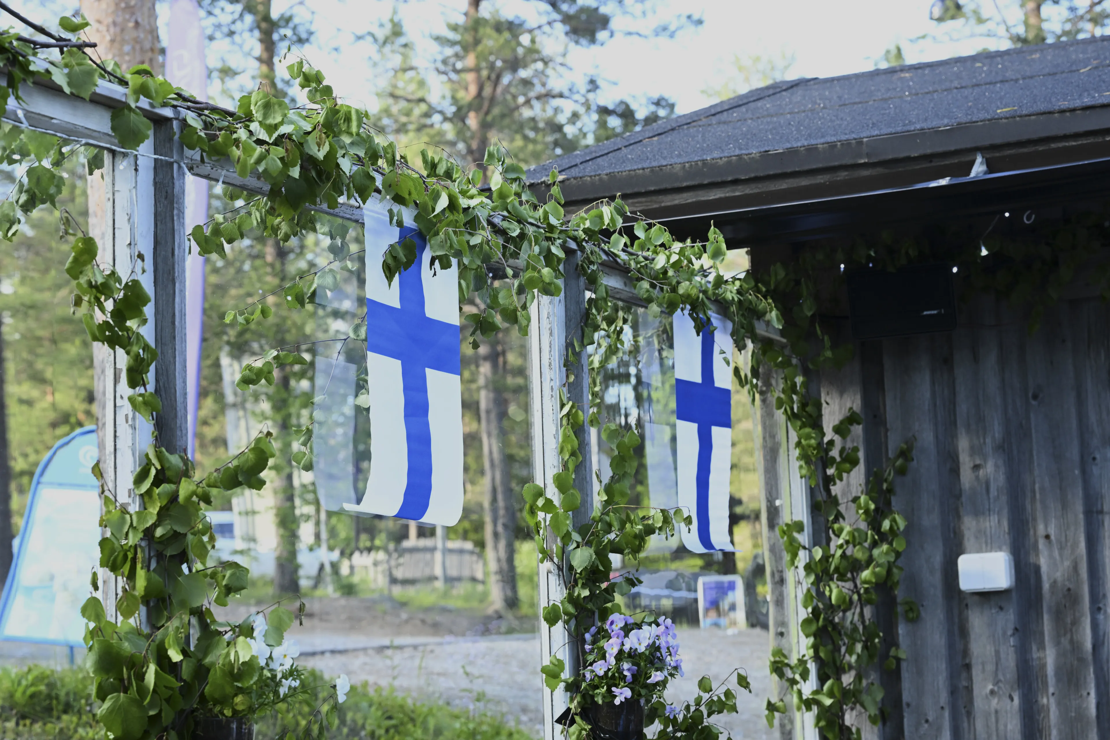 flags, Finnish flag, flag banners, outdoor decor, greenery