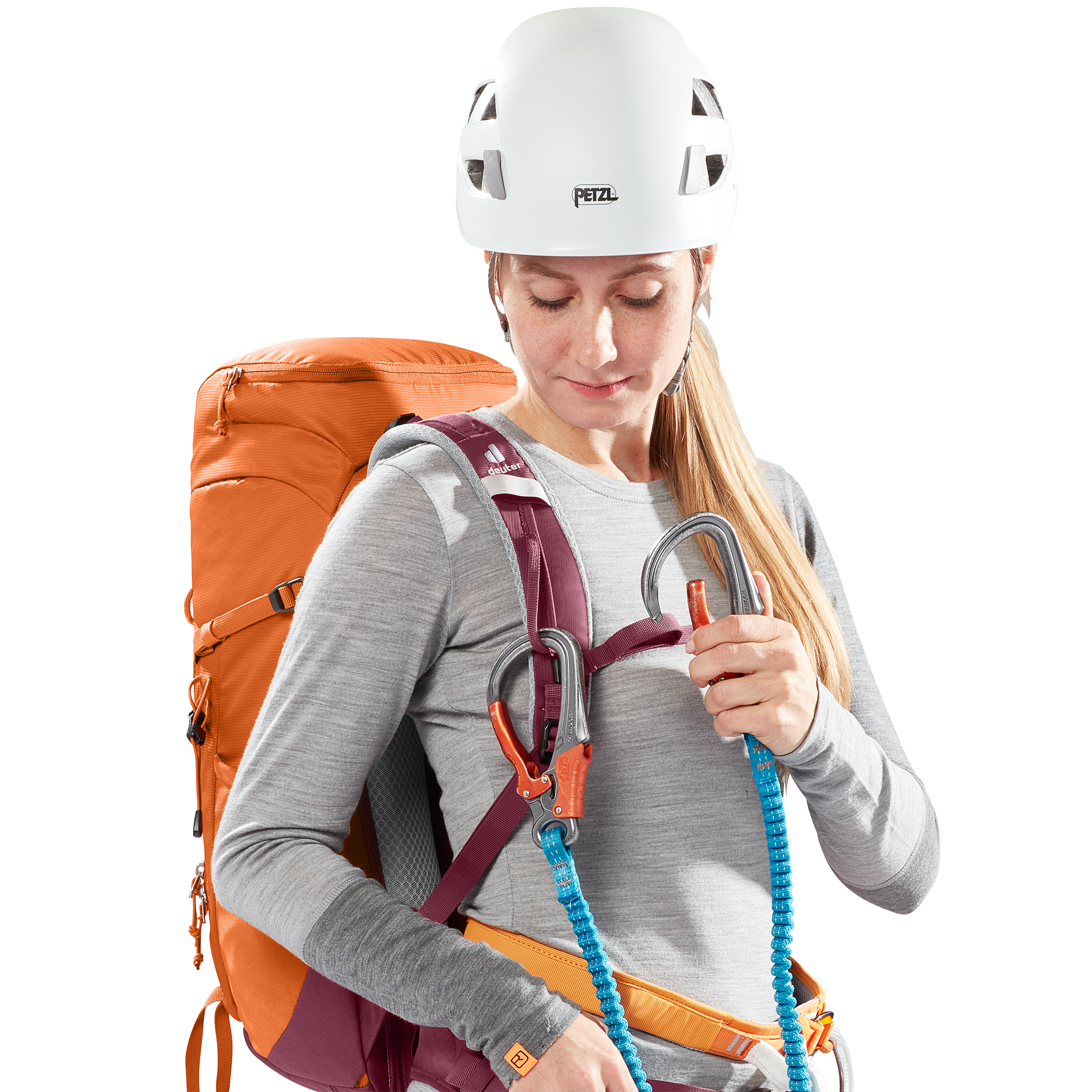 climbing helmet, harness, backpack, carabiners, rope