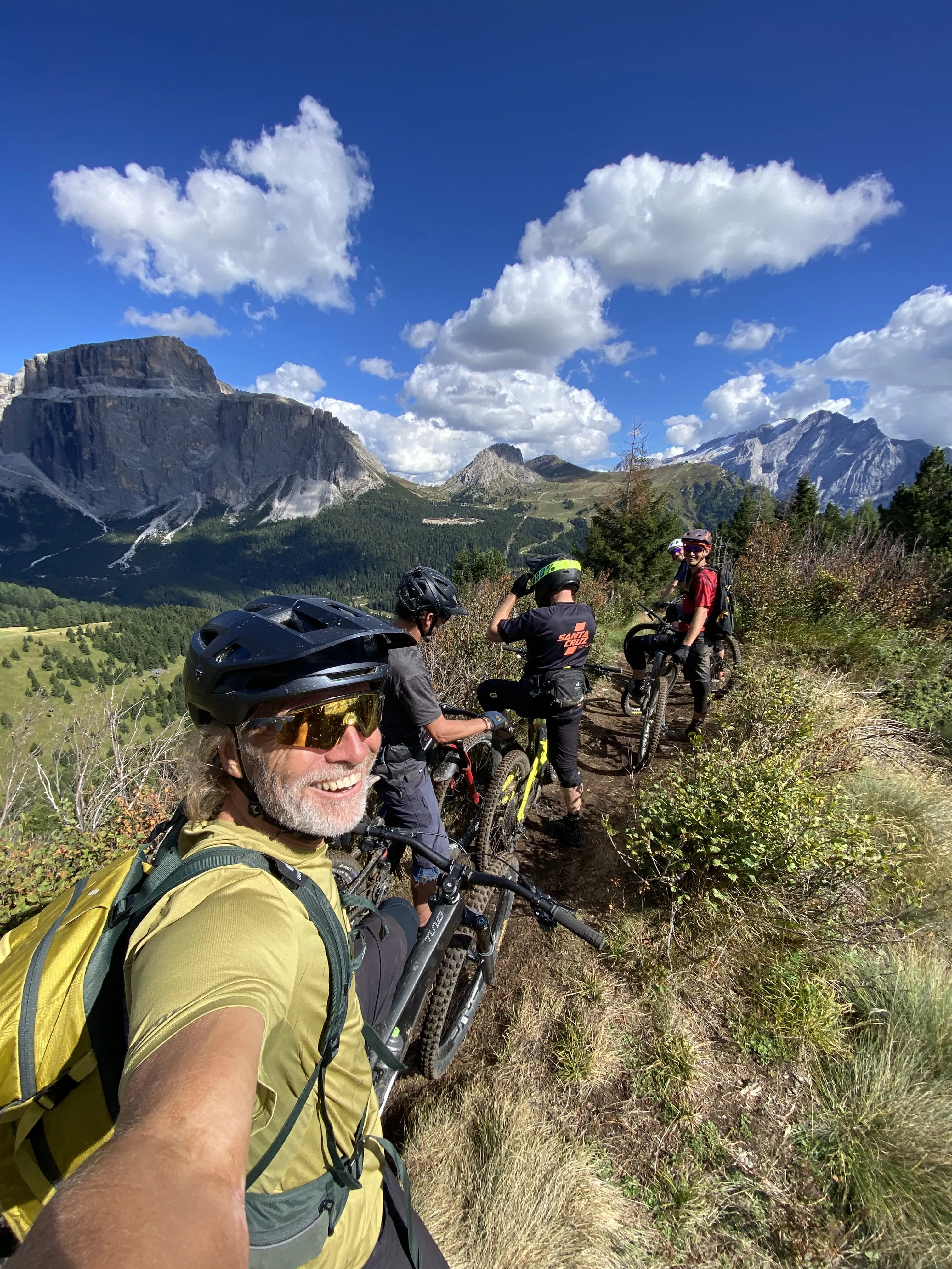 mountain bike, cyclists, outdoor scenery, trail riding, backpack