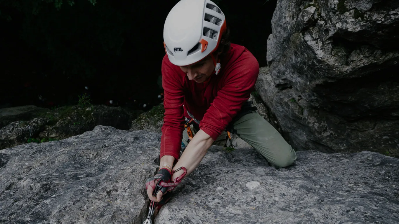 rock_climbing, helmet, harness, red_sleeves, outdoor