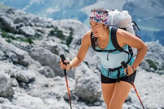 cms-element-headline-image-text-1 hiker, backpack, trekking poles, bandana, tank top