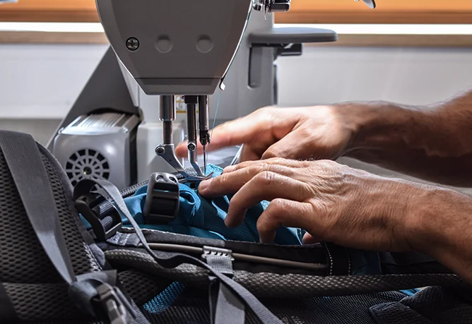 FWF headline image text Person, Sewing