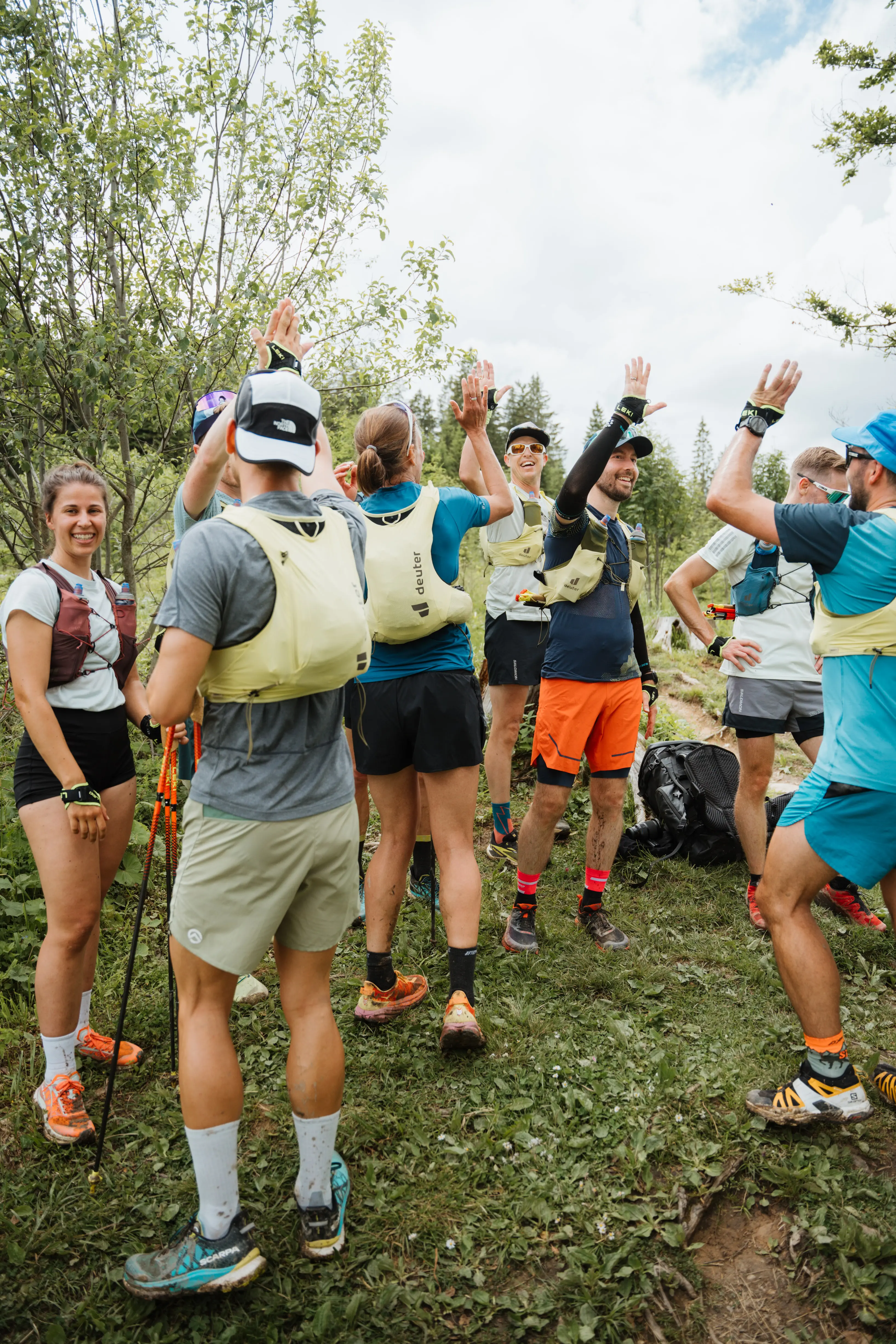 trail runners, hiking group, hydration vest, sport shoes, outdoor adventure