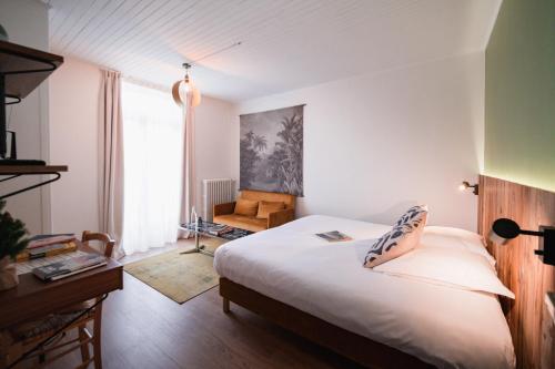 bed, white bedding, wooden bed frame, bedroom furniture