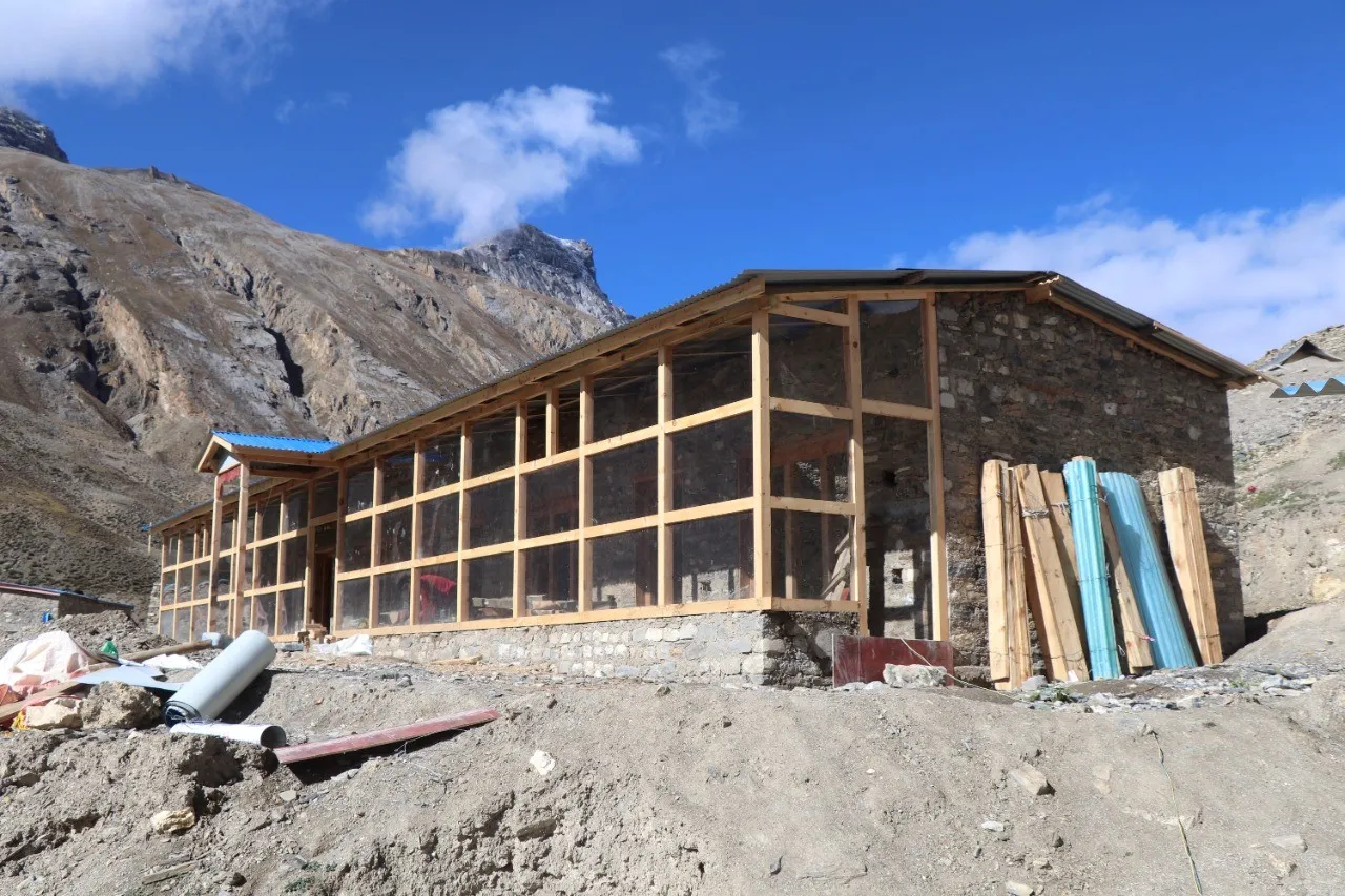 construction, building, stone wall, wood framing, blue sky