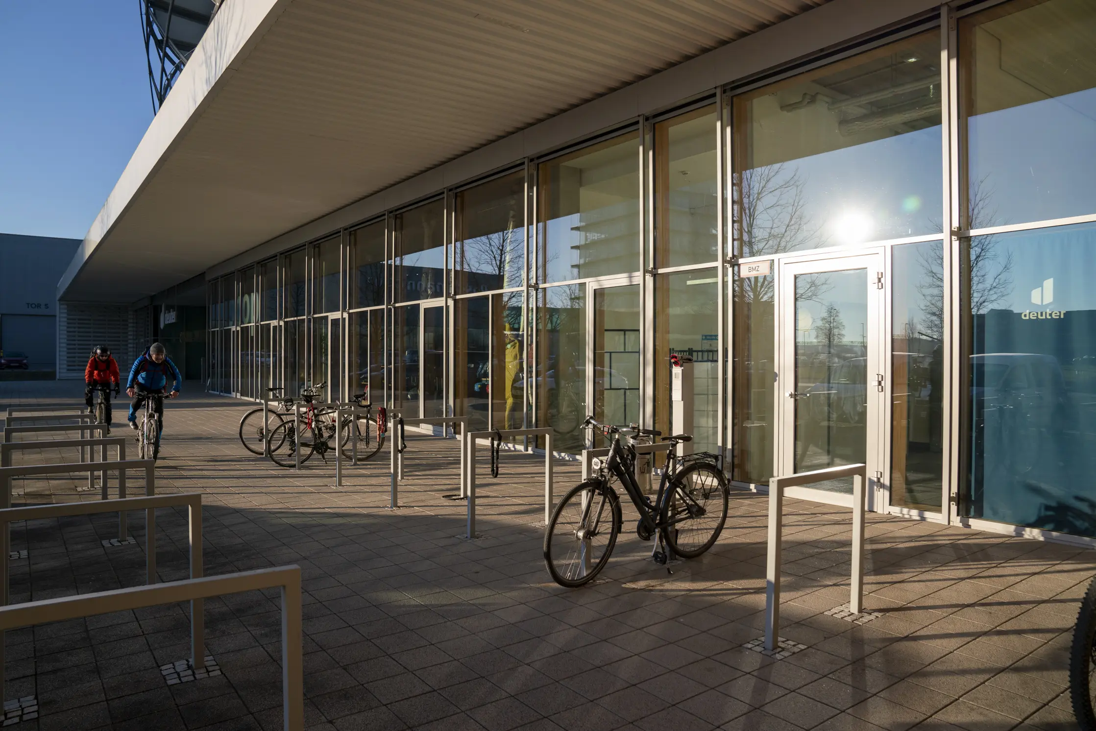 Bicycle, Person, Wheel, Building, Office Building
