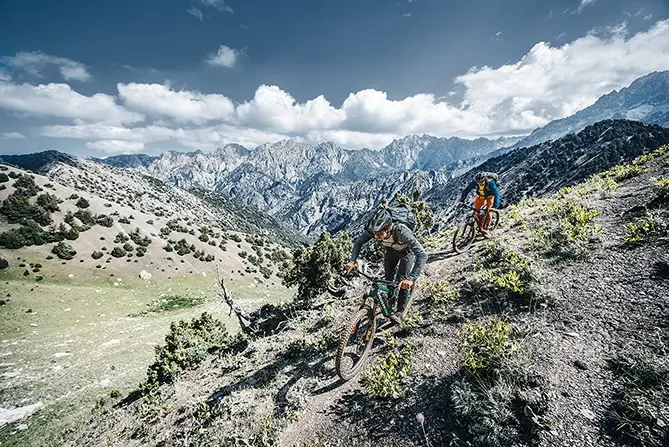 cms-element-teaser-product mountain bike, off-road, gravel trail, mountain landscape, two cyclists