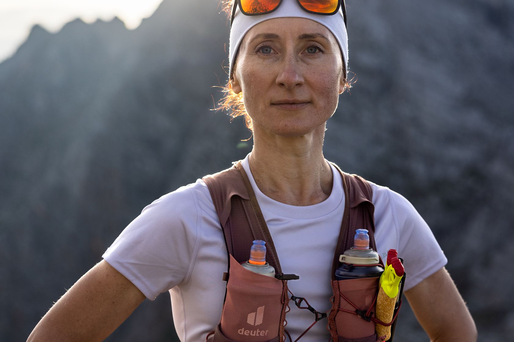 runner, hydration-pack, vest, sunglasses, bandana
