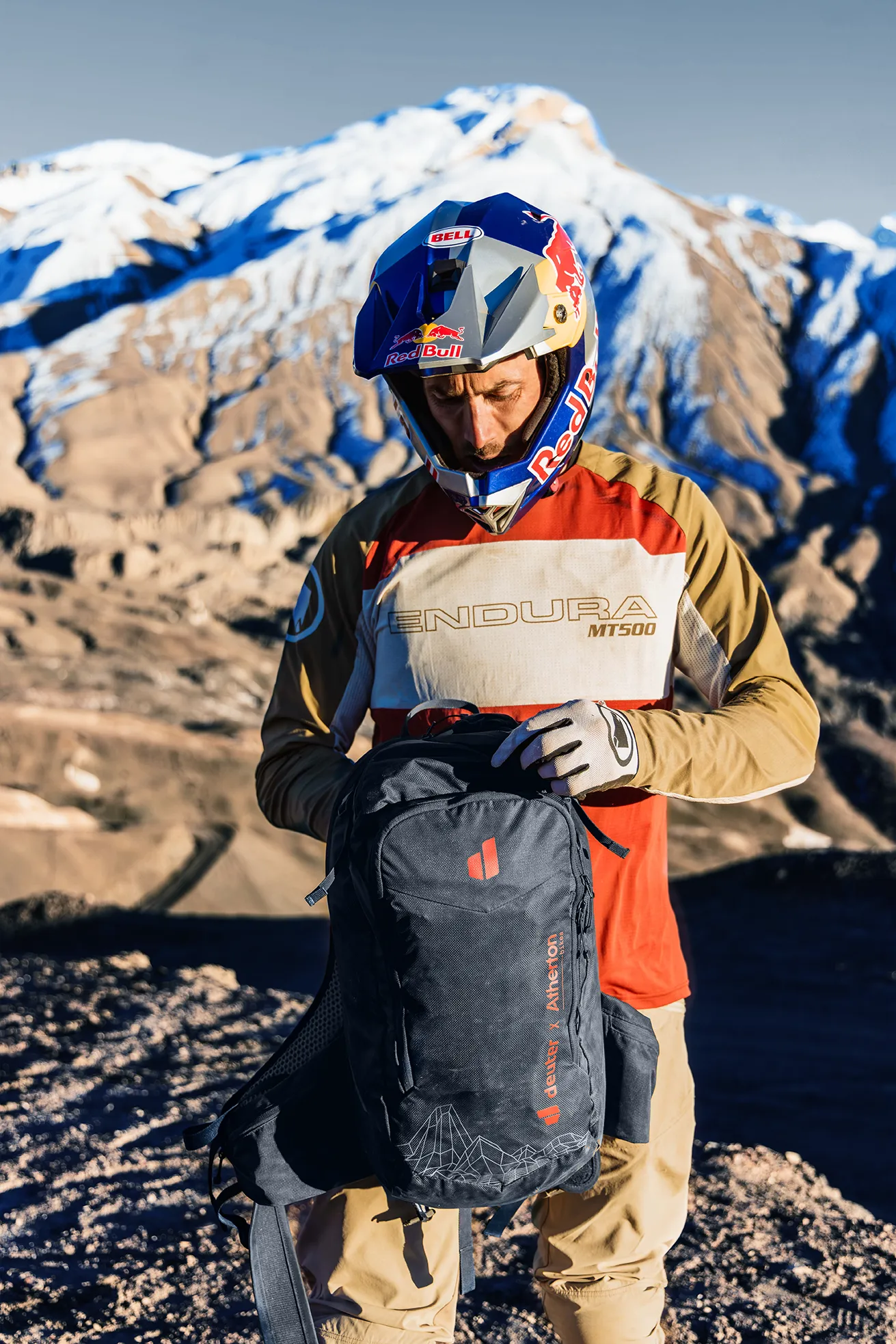 motorcycle gear, helmet, backpack, mountain, outdoor